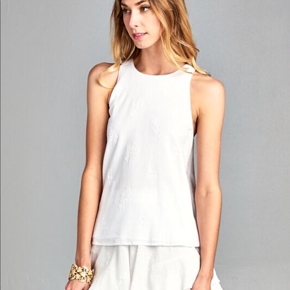 Woven top with embroidery detail